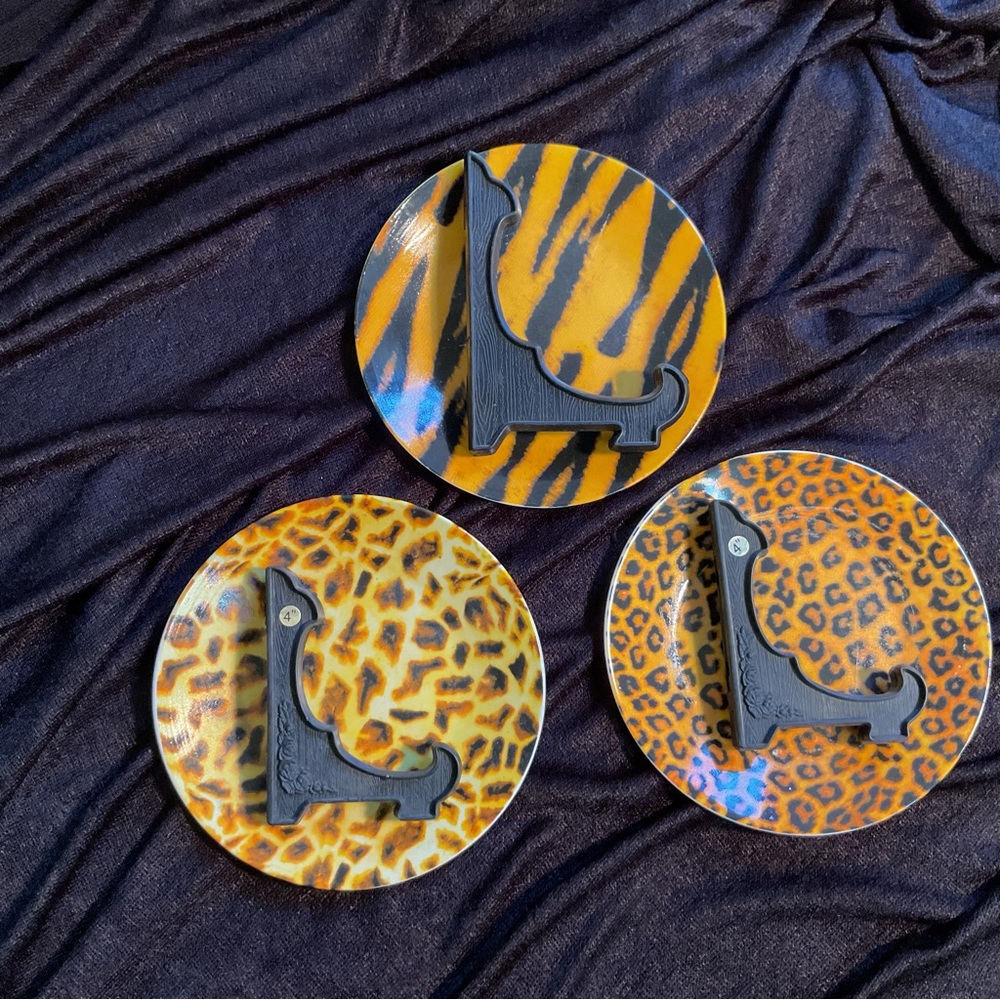 Set of Three Animal Print 6” Saucers with display stands included.